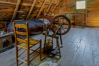 Rustic Attic Room with Spinning Wheel