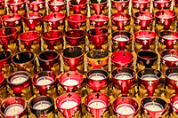 Red Votive Candles in a Church