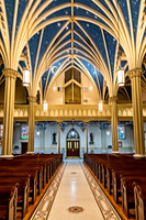 Church Interior with Pews and Arched Ceiling