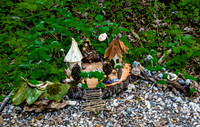 Fairyland Exhibit Miniature Houses on Tree Stump