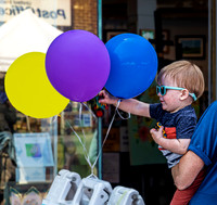 Child with Balloons and Toys