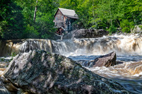 Old Mill and Rushing Waterfall