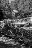 Old Mill by a Powerful Waterfall