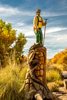 Carved Wooden Sculpture in Garden