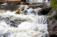 Kayaker Navigates Whitewater Rapids