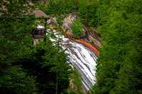 Toxaway Falls Cascading Near Building in Transylvania County