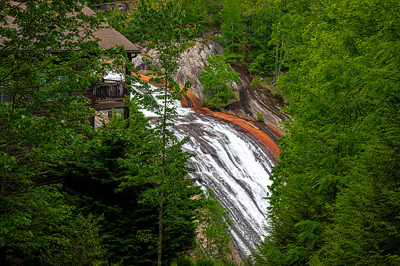 Toxaway Falls Cascading Near Building in Transylvania County