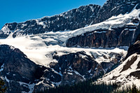 Dolomite Peak with Glaciers and Conifer Forests