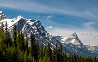 Snow-Capped Mountains and Evergreen Forest in Alberta