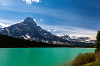 Turquoise Lake and Snow-Capped Mountains
