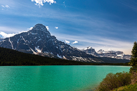 Turquoise Lake and Snow-Capped Mountains