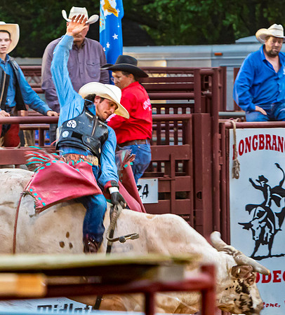 Cowboy Rides Bucking Bull at Powhatan County Rodeo