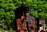 Abandoned Rusted Industrial Building in Forest
