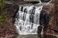 Waterfall Cascading Over Rocks