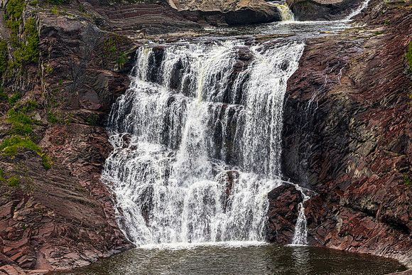Waterfall Cascading Over Rocks