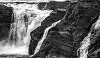 Powerful Waterfall Cascading Down Cliffs