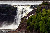 Waterfall with Dam and Green Forest