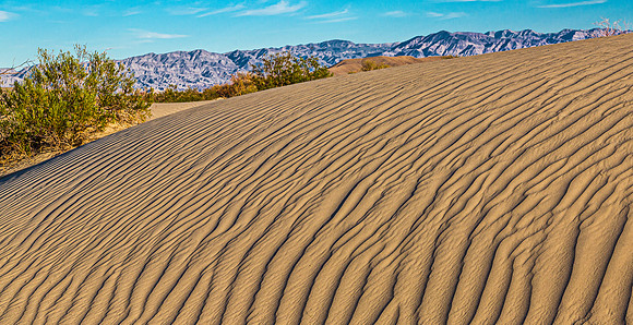 Desert Sand Dunes and Mountains