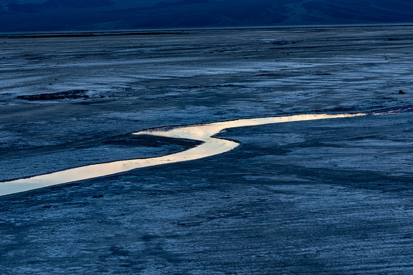 Winding River in Desolate Landscape