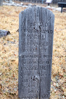 Old Wooden Grave Marker in Cemetery
