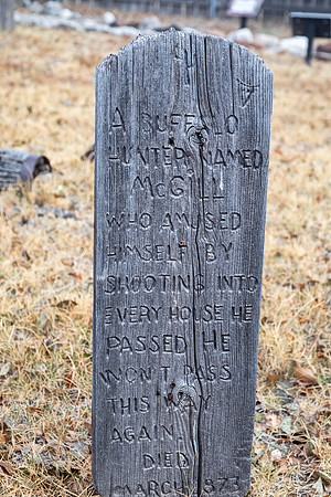 Old Wooden Grave Marker in Cemetery