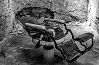 Abandoned Barber Chair in Dilapidated Room