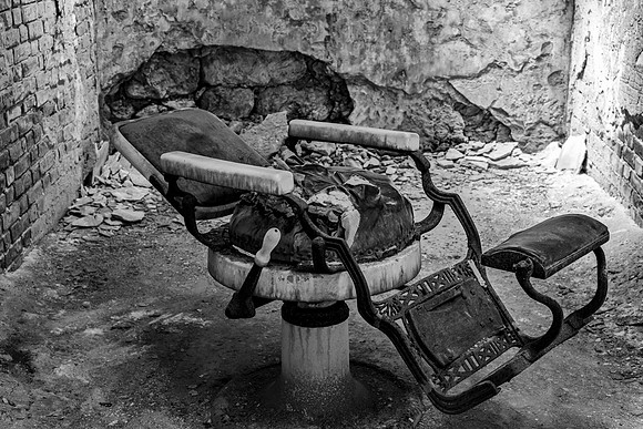 Abandoned Barber Chair in Dilapidated Room