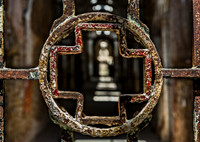 Hospital Wing Gate with Rusted Metal and Peeling Paint