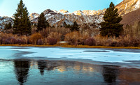 Frozen Lake and Snowy Mountains