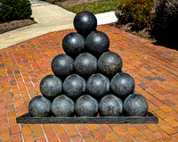 Cannonball Display on Brick Path