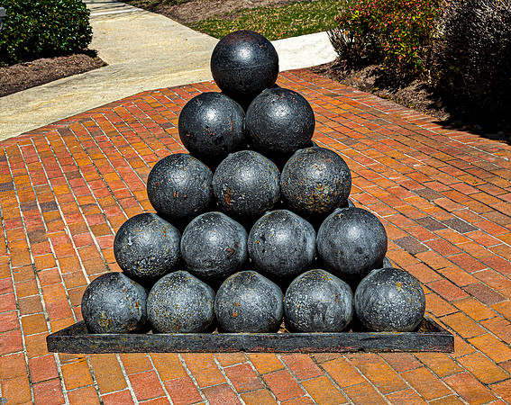 Cannonball Display on Brick Path