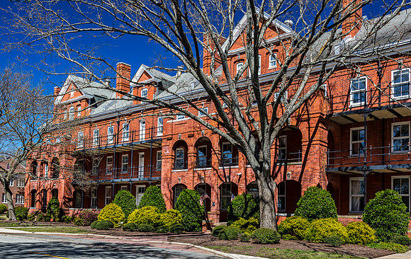 Historic Red Brick Building with Balconies