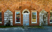 Historic Brick Building with Weathered Door