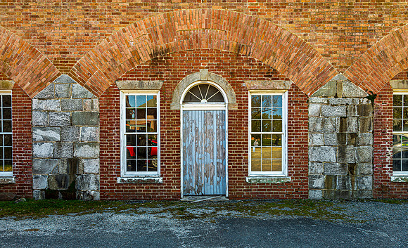 Historic Brick Building with Weathered Door