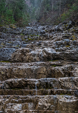Water Cascading Down Stepped Rock Formation