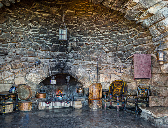 Rustic Stone Interior with Fireplace and Vintage Furniture