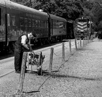 Conductor Checks Equipment on Great Smoky Mountains Railroad