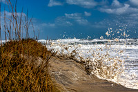 Dramatic Sea Foam and Waves on Sandy Beach