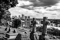 Cemetery crosses overlooking cityscape and river