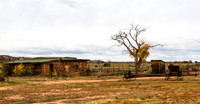 Abandoned Rustic Stone House and Farm Equipment