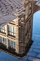 Building Reflection in Puddle