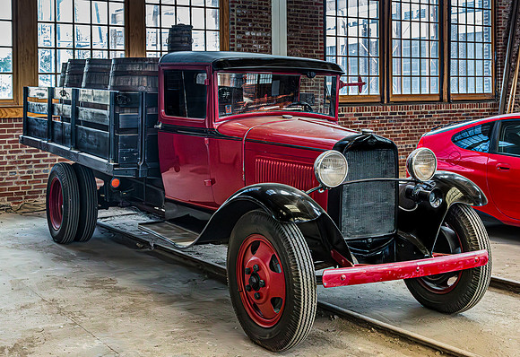 Vintage Red Truck with Barrels