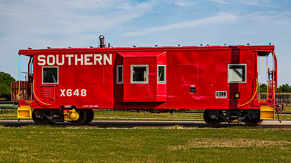Red Southern Railway Caboose X648 on Display