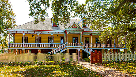 Historic Southern House with Porch and Picket Fence