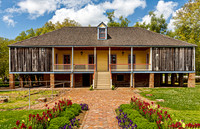 Historic Elevated House with Flowers