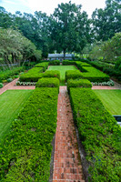 Formal Garden with Hedges and Brick Paths
