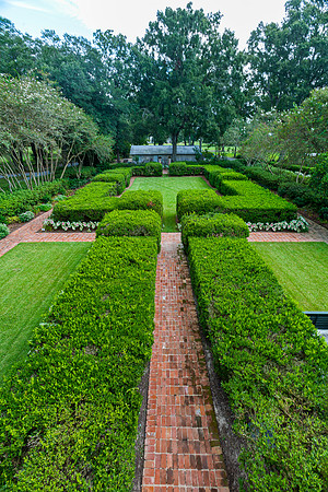 Formal Garden with Hedges and Brick Paths