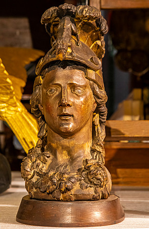 Detailed Wooden Sculpture of Head with Helmet