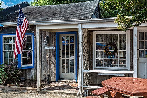 Rustic Building with American Flag