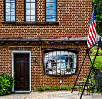 American Flag on Brick Building